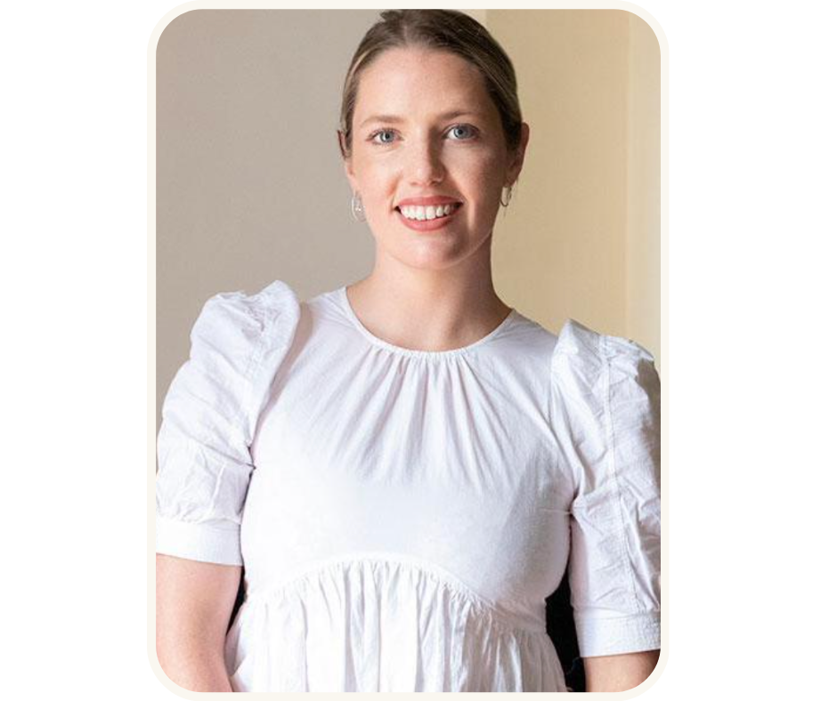 A professional woman in a white dress smiling confidently, representing the strategic advice for brands in 2023 provided by Loren Smith, a strategist at MBM agency.